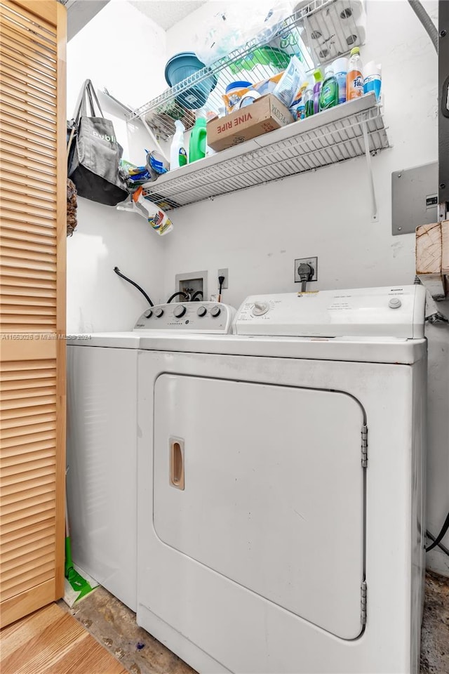 laundry room with washer and dryer