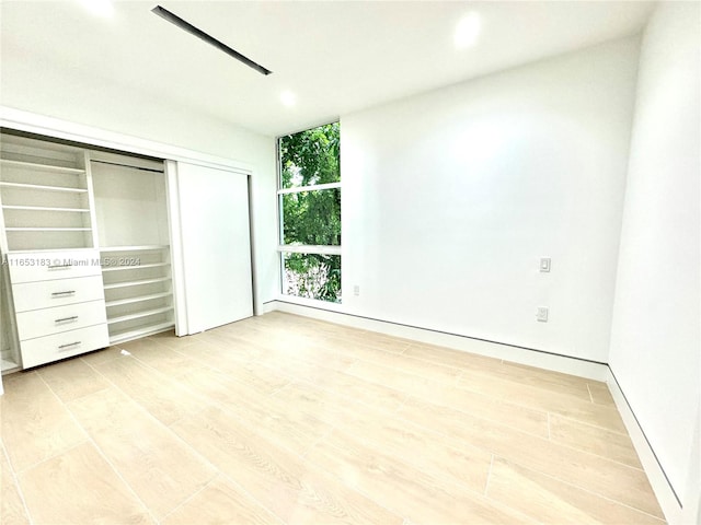 unfurnished bedroom featuring light hardwood / wood-style floors