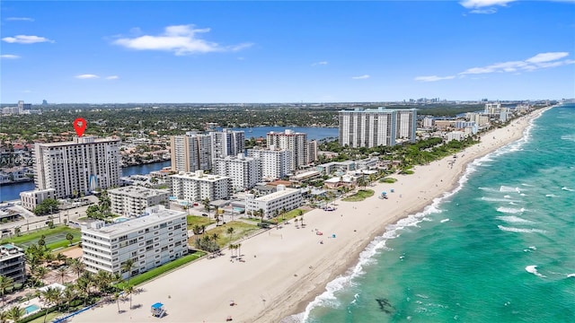 bird's eye view with a view of the beach and a water view