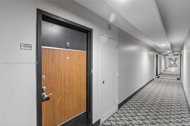 corridor featuring carpet