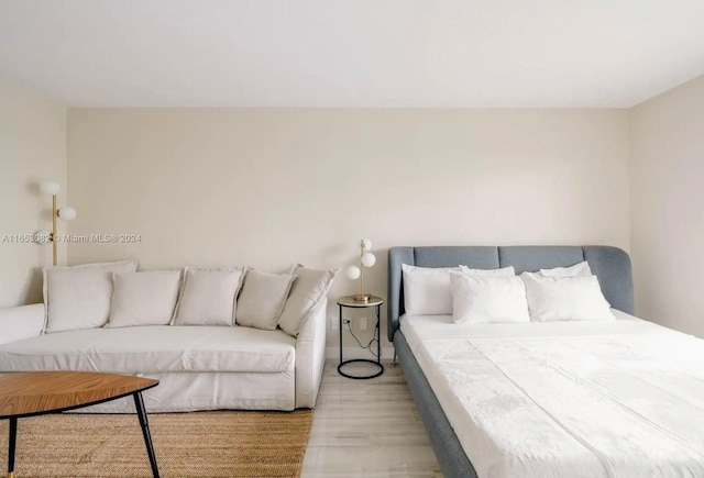 bedroom with light hardwood / wood-style floors