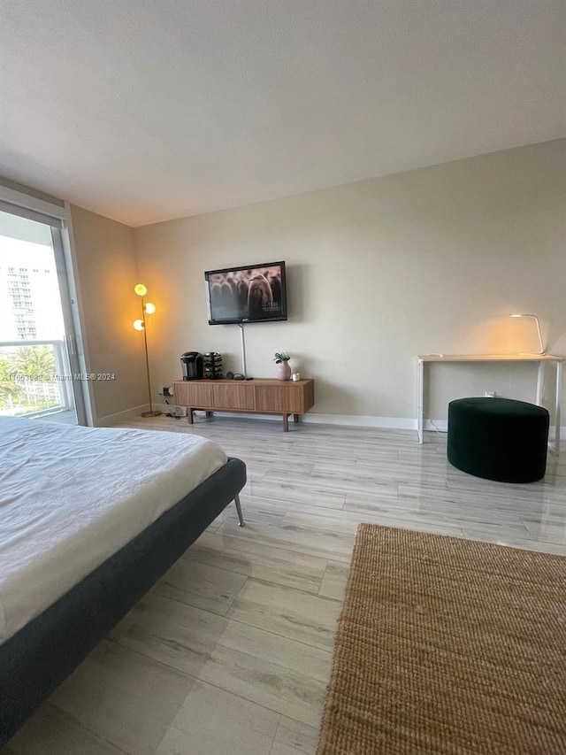 bedroom featuring light hardwood / wood-style floors