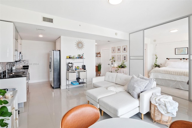 living room featuring light tile patterned flooring