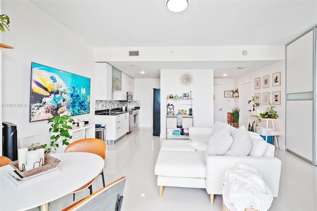 living room with sink