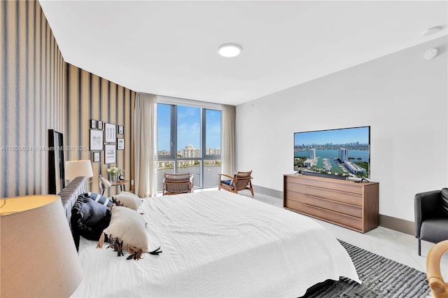 bedroom featuring light colored carpet