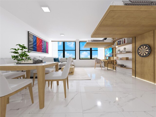 dining area featuring wood walls