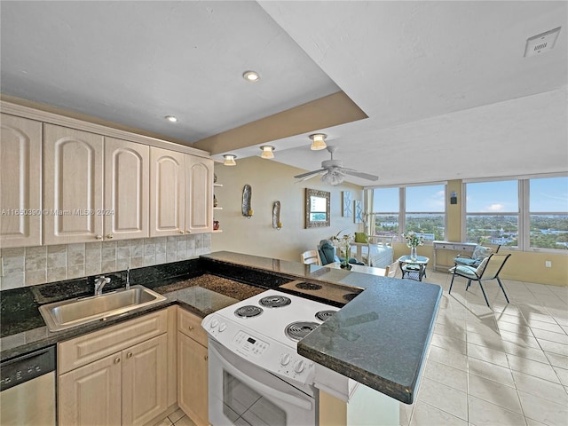 kitchen featuring white electric range, dishwasher, sink, ceiling fan, and light brown cabinets