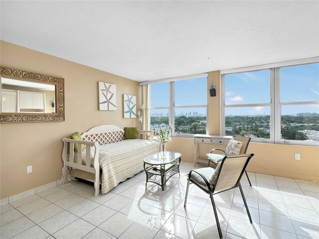 bedroom with light tile patterned flooring