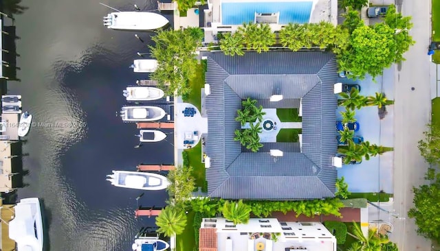 birds eye view of property featuring a water view