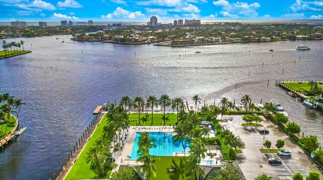 drone / aerial view with a water view and a view of city