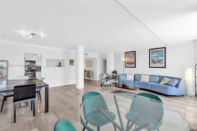 living room with ornamental molding