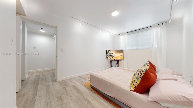 bedroom featuring light hardwood / wood-style flooring