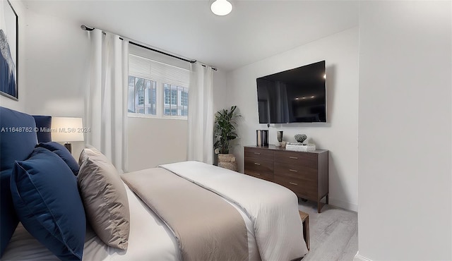 bedroom featuring light wood-type flooring