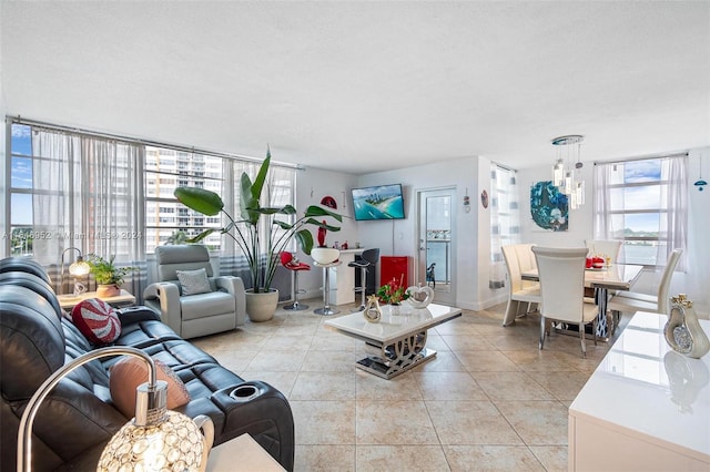 tiled living room with a textured ceiling