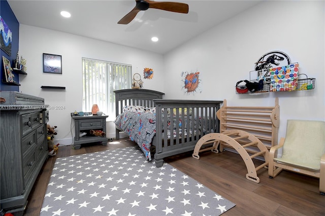 bedroom featuring dark wood-type flooring, ceiling fan, and lofted ceiling