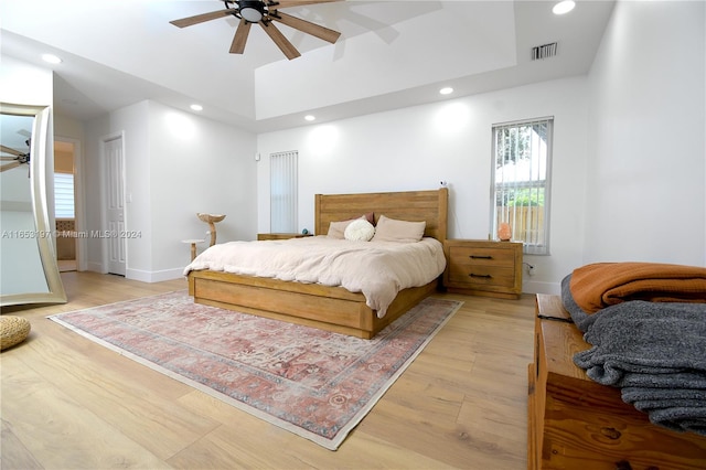 bedroom with light wood-type flooring and ceiling fan