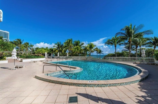 view of pool featuring a patio area