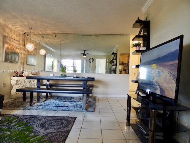 interior space featuring crown molding and ceiling fan