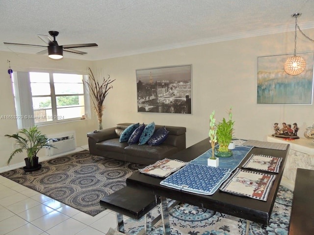 tiled living room featuring ceiling fan, ornamental molding, a wall mounted air conditioner, and a textured ceiling