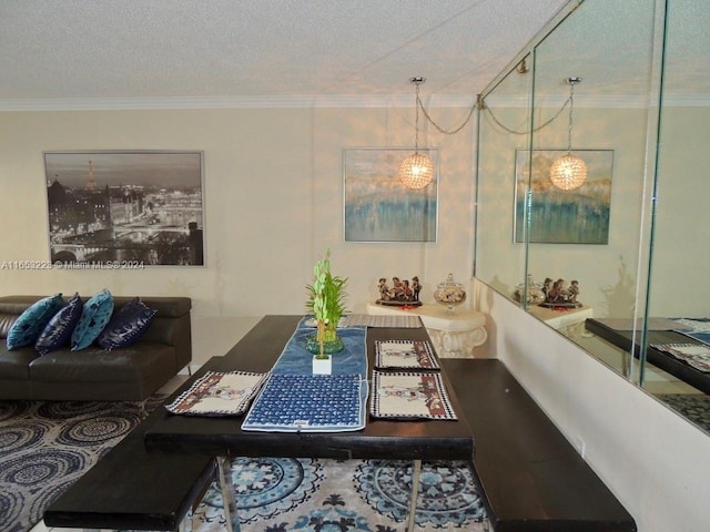 dining room featuring crown molding and a textured ceiling