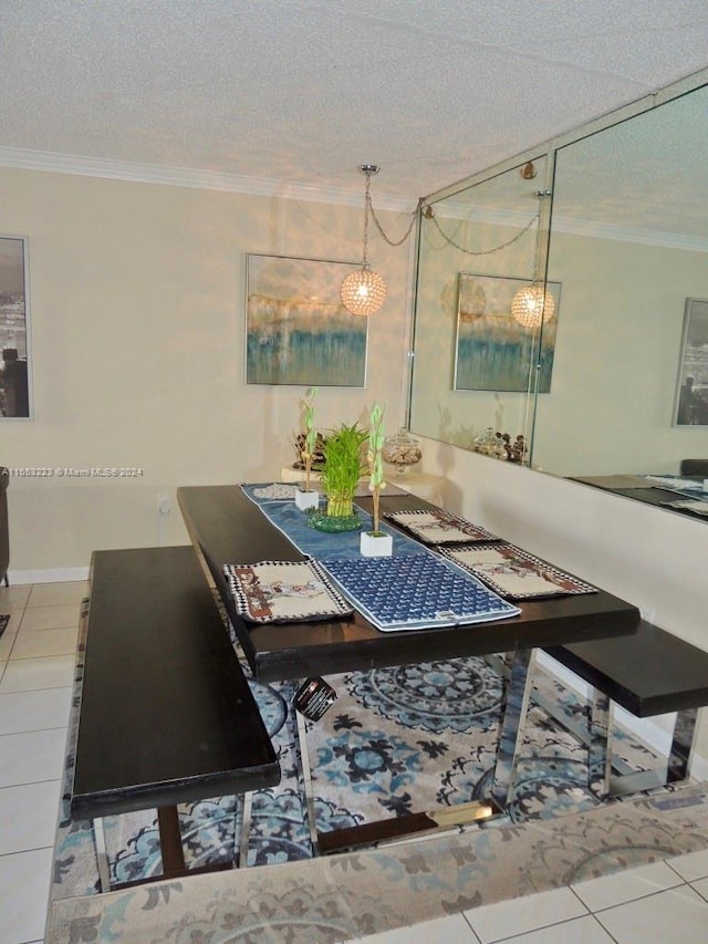 dining space featuring a textured ceiling, crown molding, and tile patterned floors