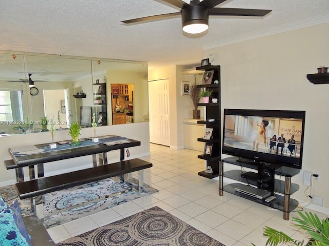 tiled living room featuring crown molding, a textured ceiling, and ceiling fan