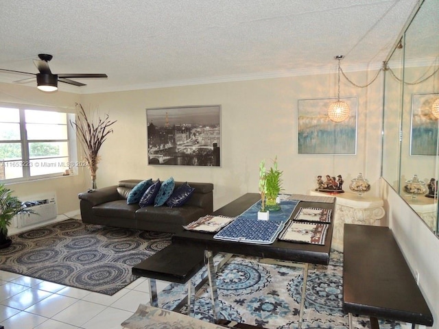 tiled living room featuring ceiling fan with notable chandelier, ornamental molding, and a textured ceiling