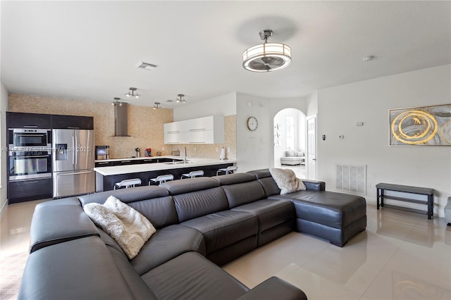 tiled living room with sink