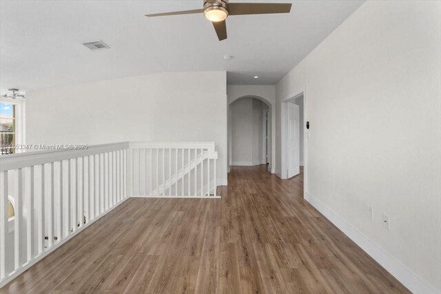 unfurnished room with wood-type flooring