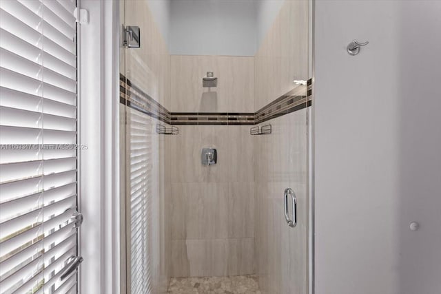 bathroom featuring walk in shower