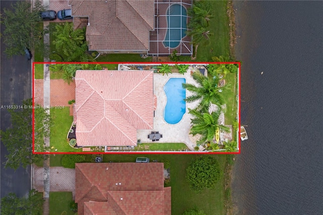 drone / aerial view with a water view