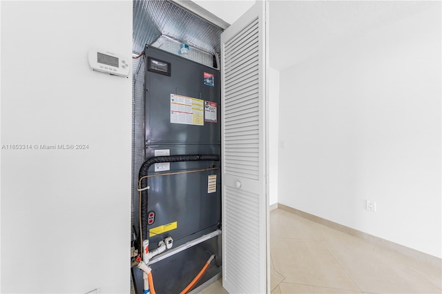 utility room with heating unit