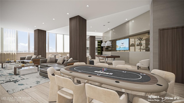 recreation room featuring light hardwood / wood-style flooring