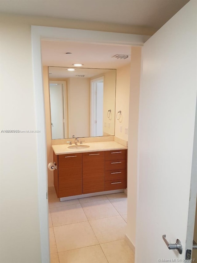 bathroom featuring vanity and tile patterned floors