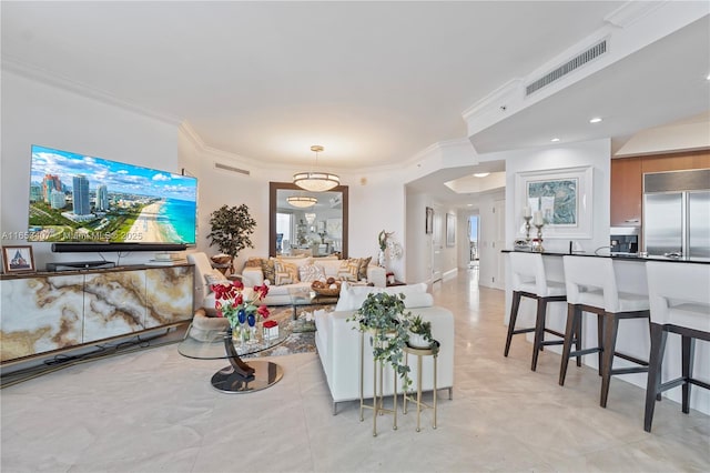 living room with ornamental molding