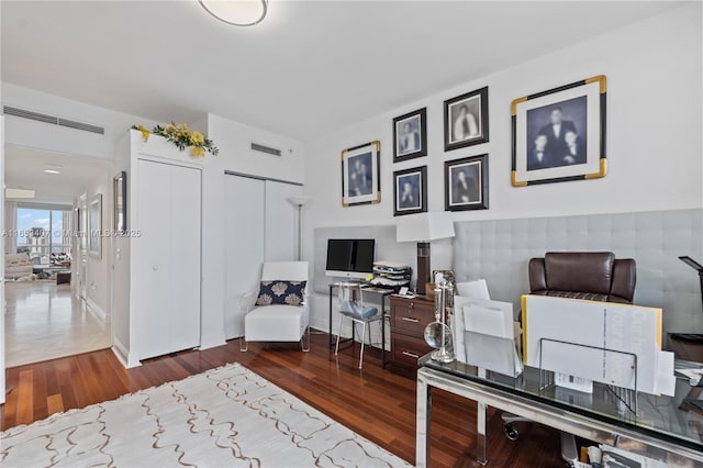 office space with hardwood / wood-style flooring