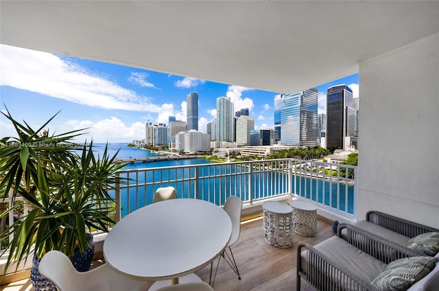 balcony featuring a water view