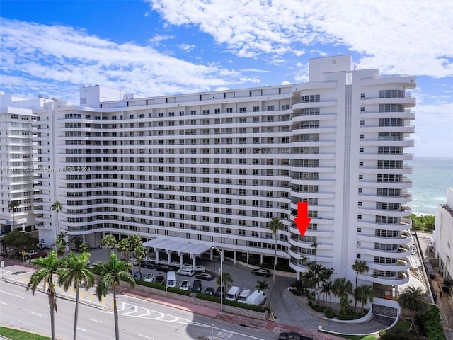 view of building exterior featuring a water view