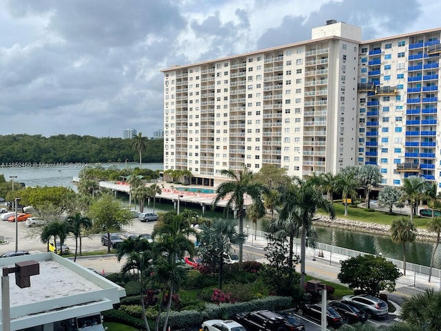 view of building exterior with a water view