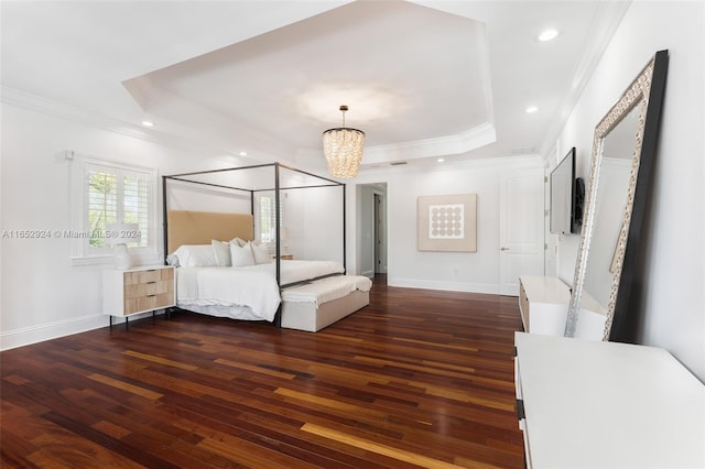 unfurnished bedroom with ornamental molding, a raised ceiling, dark wood-type flooring, and a notable chandelier