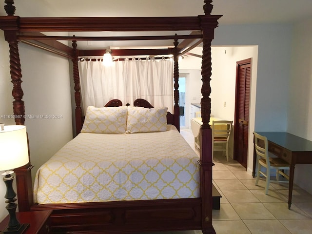 bedroom featuring light tile patterned floors