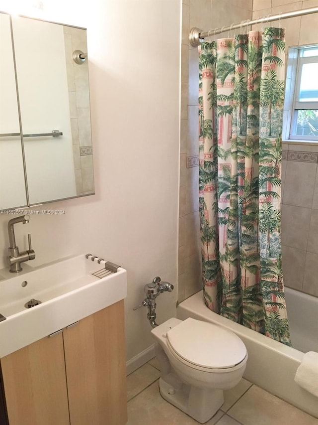 full bathroom with shower / bath combo with shower curtain, tile patterned flooring, toilet, and vanity