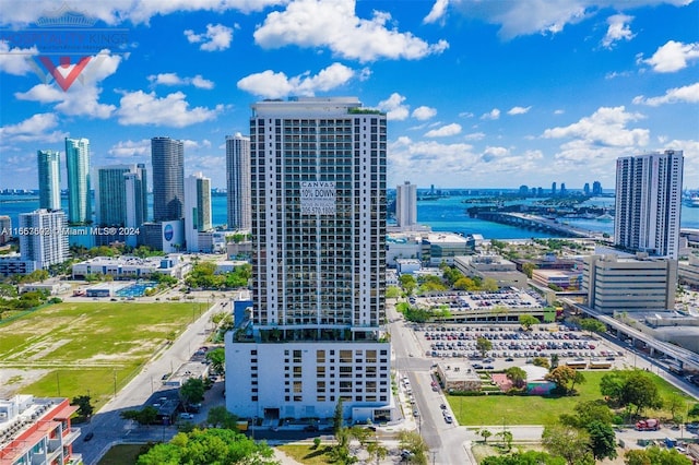 birds eye view of property featuring a water view