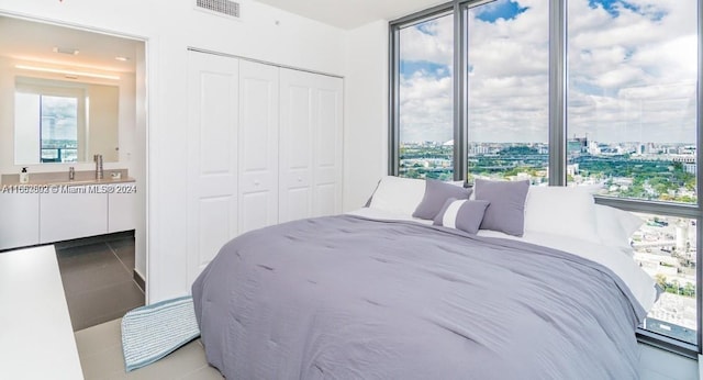 bedroom featuring a closet and tile patterned floors