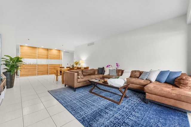 living room with light tile patterned floors