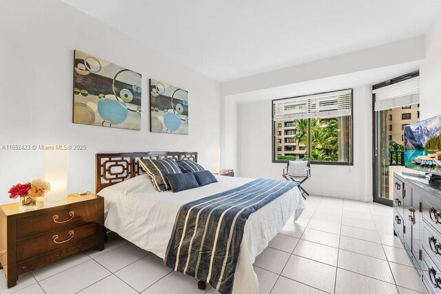 bedroom featuring light tile patterned floors