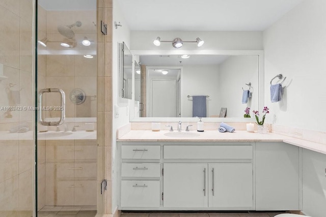 bathroom featuring vanity and walk in shower