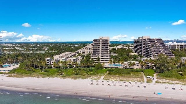 drone / aerial view with a view of the beach and a water view