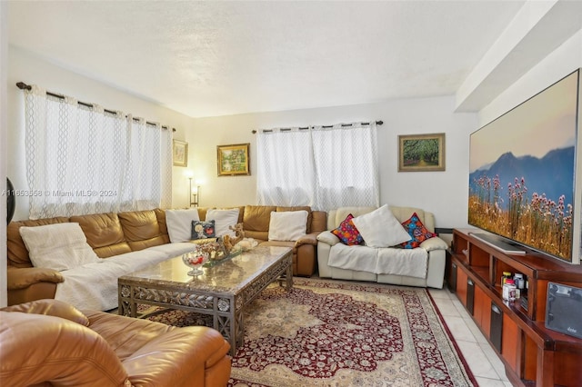 living room with light tile patterned floors