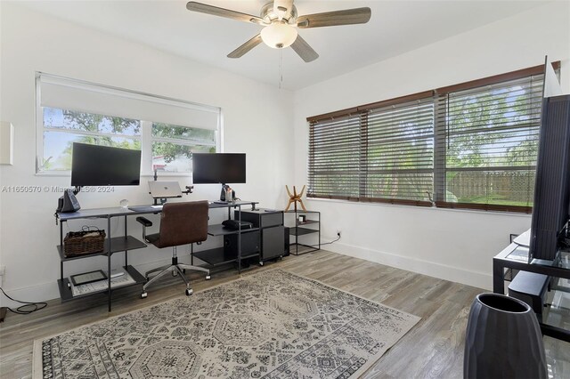 office featuring ceiling fan and hardwood / wood-style flooring